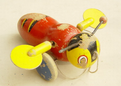 https://www.funhotoys.co.nz/getattachment/Fun-Ho-History/Home/Other-New-Zealand-Toys/Wooden-toys/Ramsey-Toys/Buzzy-bee-with-wooden-wings.jpg.aspx